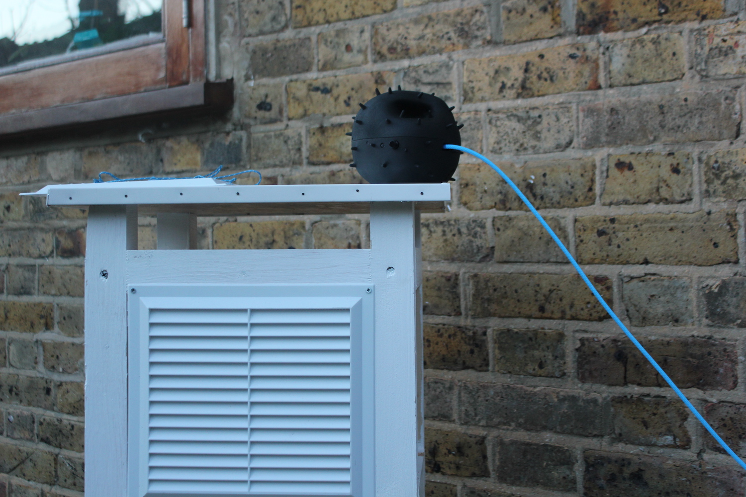 Dustbox 2.0 on a Stevenson screen in a garden