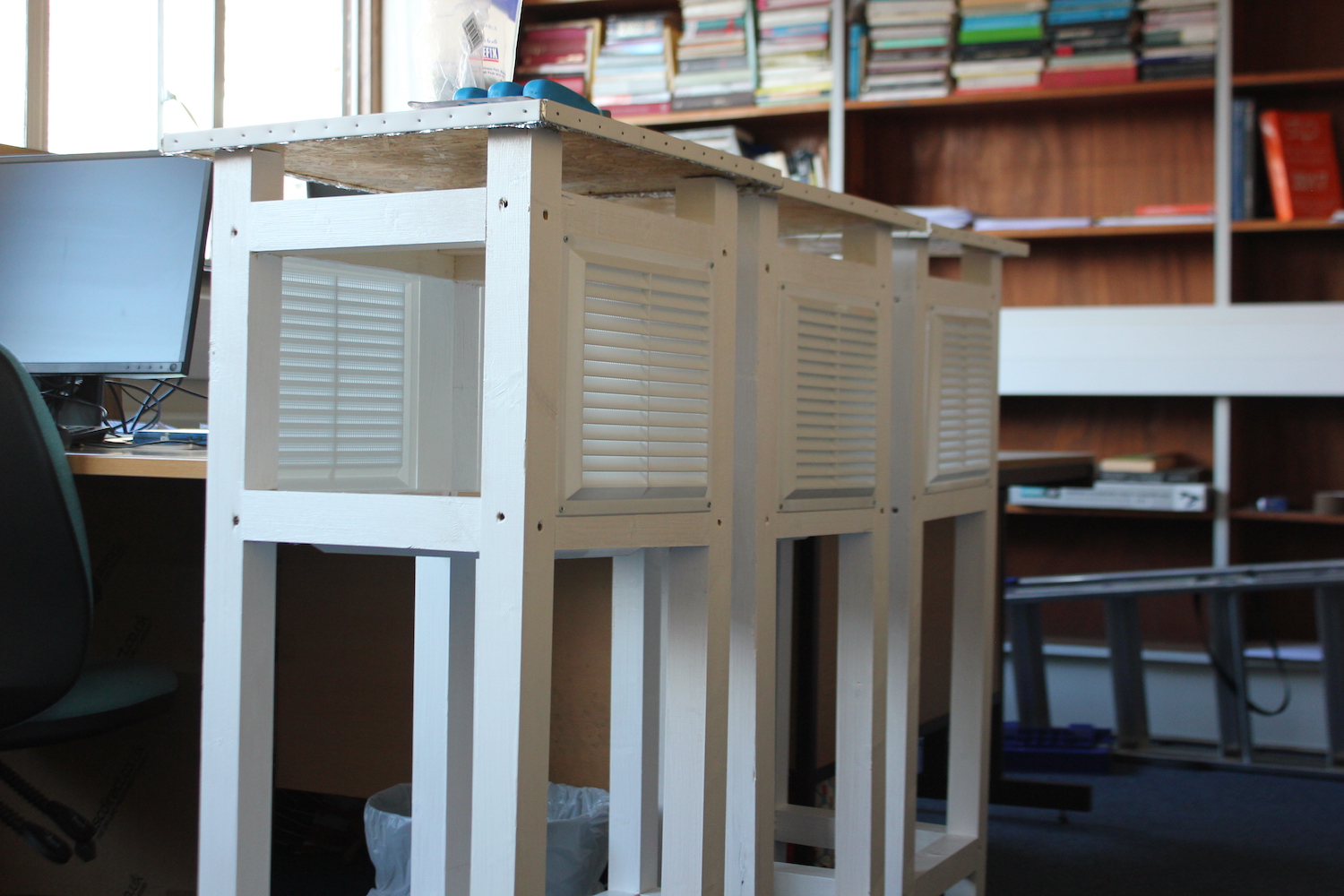 Three white Stevenson screens built and ready to be deployed